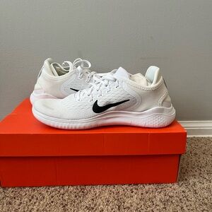 Nike White and Black Sneakers Modern Athletic Design